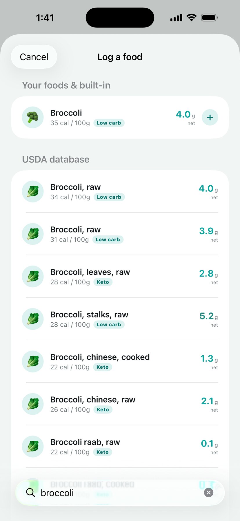 Searching the built-in USDA food database, showing net carbs and a keto badge on each result